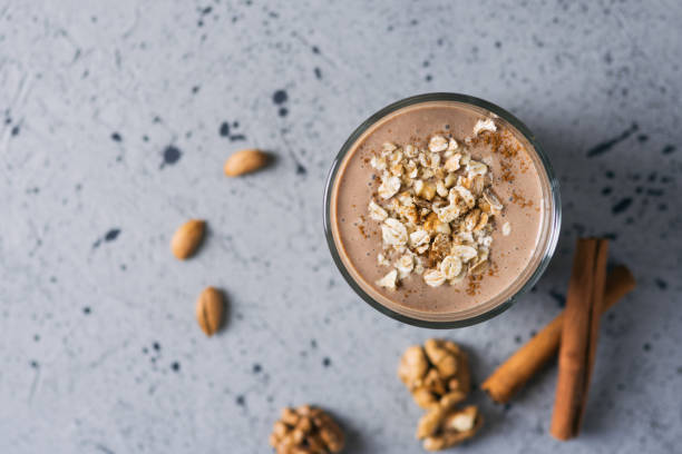istock Chocolate milk smoothie with oatmeal and nuts. Place for text 1161367738