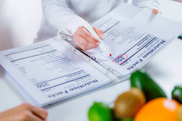 istock Nutritionist with female patient 1161369272