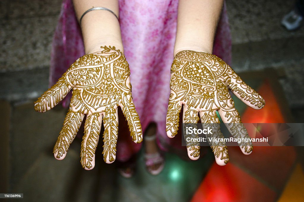 Indian Girl showing her Heena Tattoo on Hands Indian Girl showing her Heena Tattoo Ceremony Stock Photo