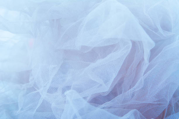 istock Lightweight fabric mesh lace. Texture of the blue fabric is beautifully draped 1161370659