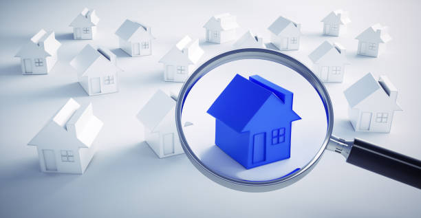 istock Blue toy house with a magnifying glass 1161371536