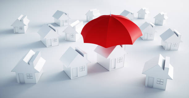 istock Toy House under a red umbrella 1161371867