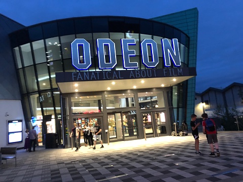 Trowbridge, Wiltshire, England - July, 11, 2019: Stock photo showing St. Stephen's Place Leisure Park an entertainments centre with restaurants and the Odeon Cinema.