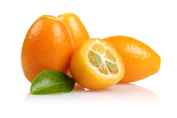 istock Fresh kumquats and leaf isolated on white 1161385341