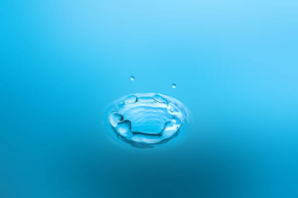 istock Water splash close-up. Drop of water. Blue water drop. Falling water. 1161385347