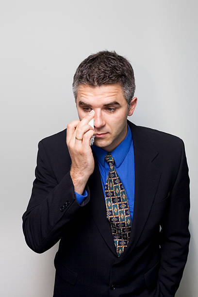 Businessman crying stock photo