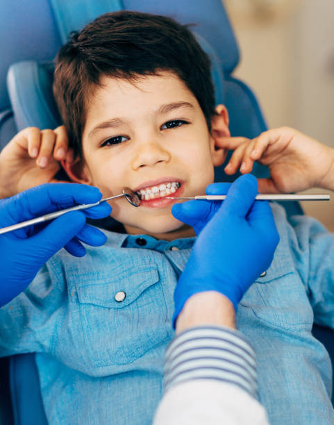 istock Little boy at regular dental check-up 1161388657