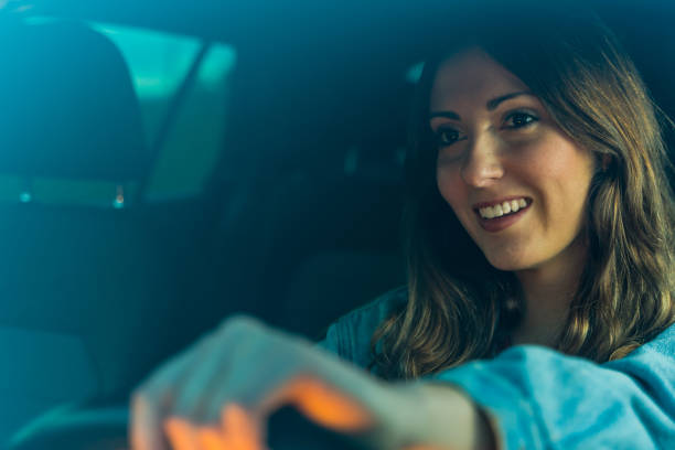 istock Young woman driving a car 1161388886