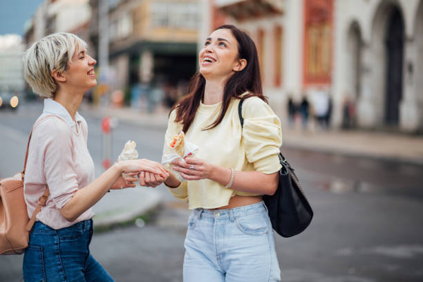 istock Women eating lunch and smiling 1161392029