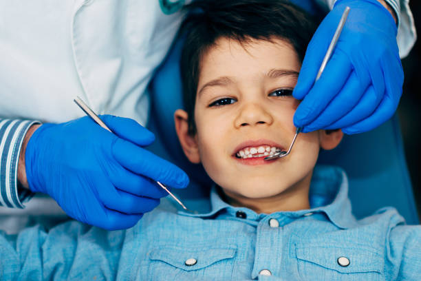 istock Little boy at regular dental check-up 1161394734
