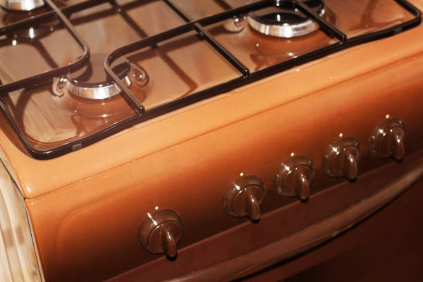 old vintage gas stove over white background