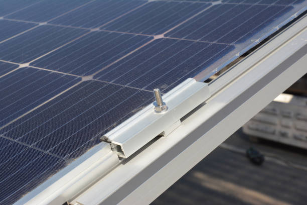 istock Close up on solar panels holder installation. 1161403456