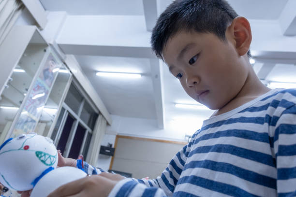 istock Asian boy enjoy hand drawing 1161403774
