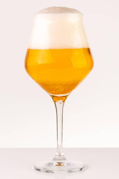 istock Glass of beer on white background 1161405283