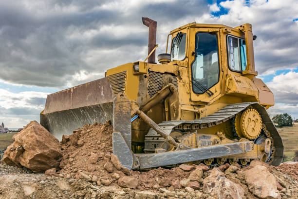 istock Gravel mountain with an excavator in the background 1161406100