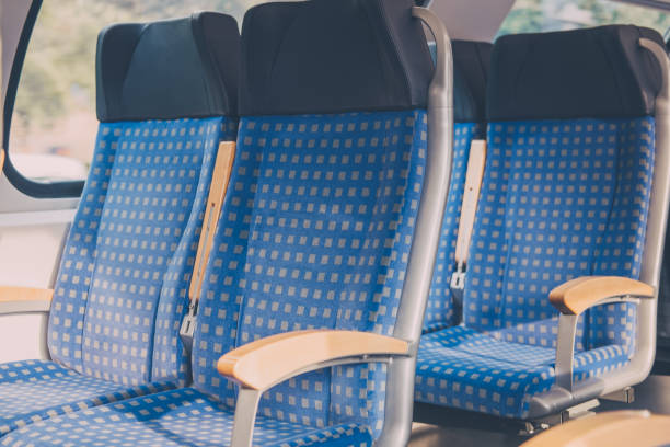 istock Rows of seats inside empty modern train, travel concept, selective focus. 1161406764