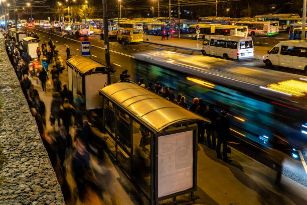 istock passengers waiting and boarding buses at the bus terminal 1161408013