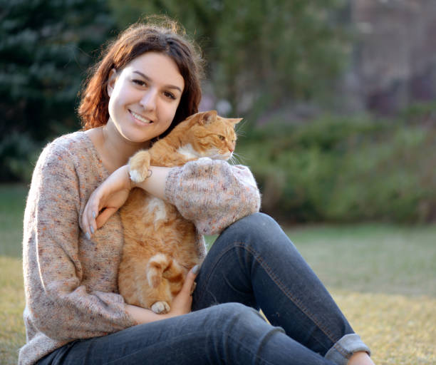 istock Woman and Cat ( summer) 1161409476
