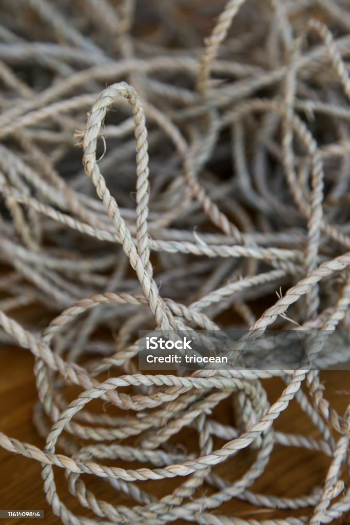 Tangled And Twisted Thin Rope Closeup Stock Photo - Download Image Now -  Abstract, Aging Process, Art - iStock, Thin Rope 