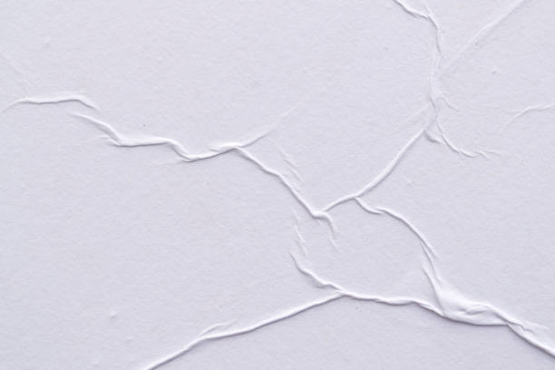 istock White creased poster texture. Abstract background. 1161411257