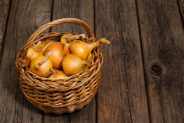 istock Basket of onions 1161412293