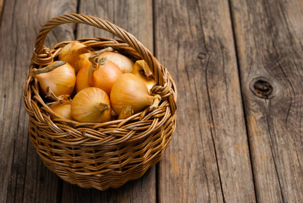 istock Basket of onions 1161412361