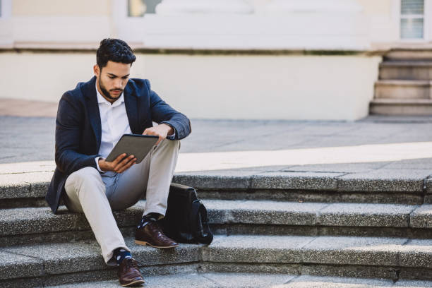 istock Wherever he goes his tab goes too 1161412838