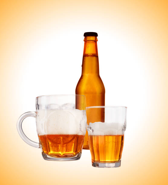 istock bottle of beer with a beer mug 1161414139