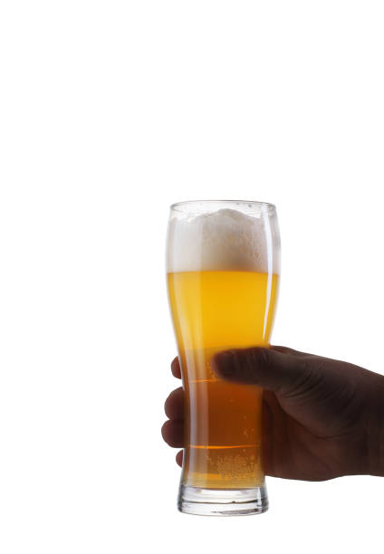 istock a pint of beer kept in a hand 1161416621