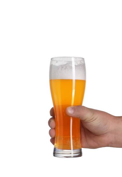 istock a pint of beer in a hand 1161416665