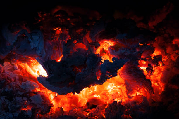 istock burned fire in the furnace, coals and open fire 1161416720