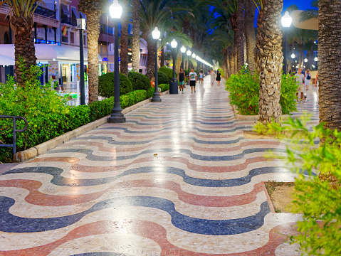 Beautiful alley with palm trees - Explanada de Espana. Alicante. photo