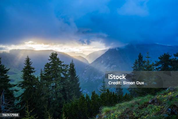 Montenegro Warm Orange Sunset Light Breaking Through Clouds Over Tara River Canyon From Peak Viewpoint Of Mount Curevac In Durmitor National Park Stock Photo - Download Image Now