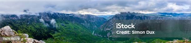 Montenegro Xxl Panorama Of Green Tara River Canyon Nature Landscape From Peak Of Mount Curevac With Dramatic Cloudy Sky In Durmitor National Park Stock Photo - Download Image Now