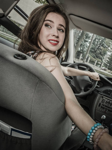 istock Woman driving a car 1161418474