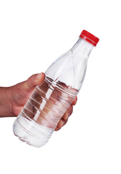 istock a bottle of water held in your hand 1161419347