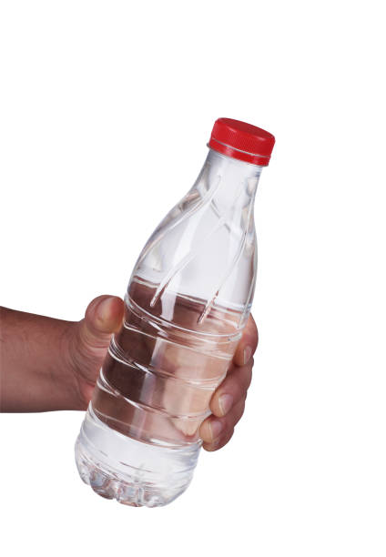 istock a bottle of water held in your hand 1161419432