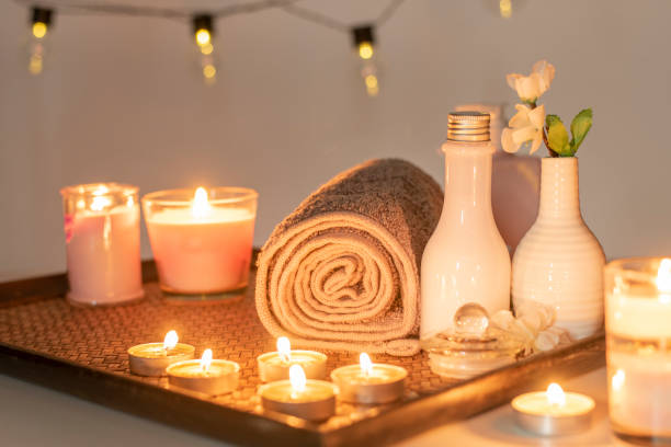 istock Beauty spa treatment with candles, Massage background 1161419598