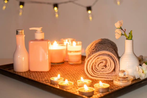 istock Beauty spa treatment with candles, Massage background 1161419599