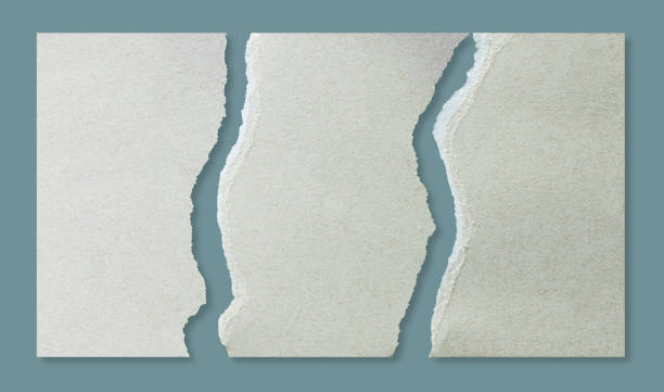 Tear the brown paper Tear the brown photo paper with copy space for creative design material isolated on pastel blue background with clipping path hole cards stock pictures, royalty-free photos & images