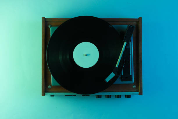 istock Retro vinyl record player. Neon light, top view 1161421904