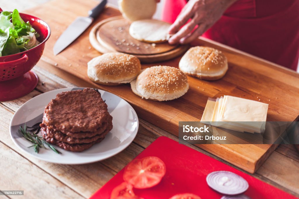 Hamburger Making Burger Bun Cut Onto Halves Closeup Hamburger Making Process Stock Photo ...