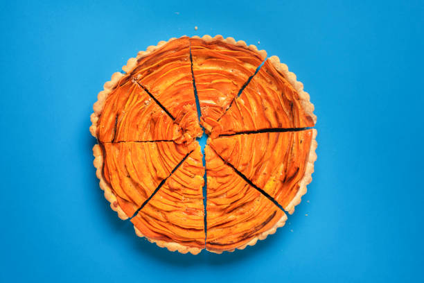 istock Sliced sweet potato tart on blue background 1161422862