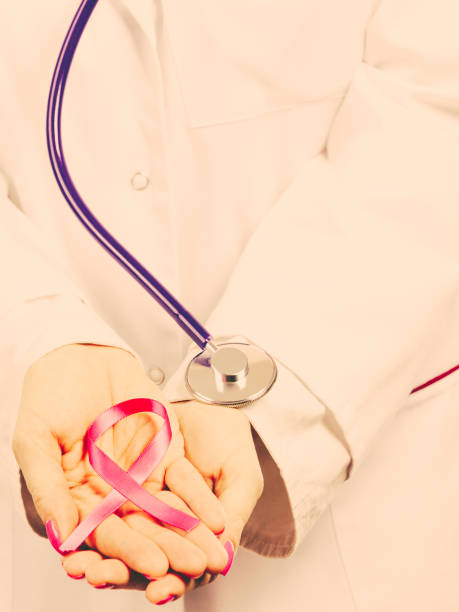 istock Female hands with pink ribbon 1161423930