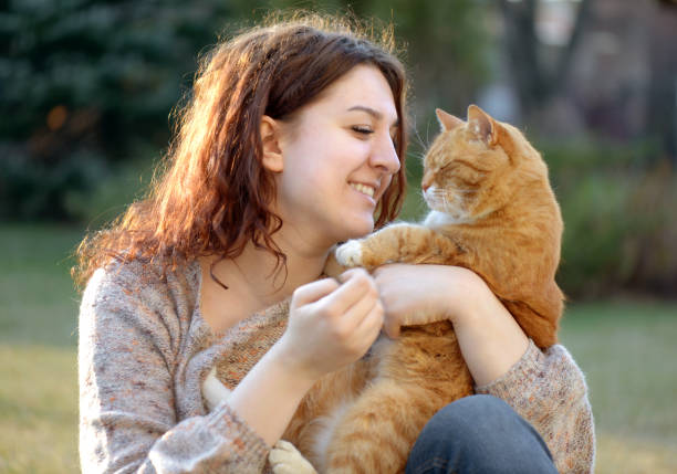 istock Woman and Cat ( summer) 1161424166