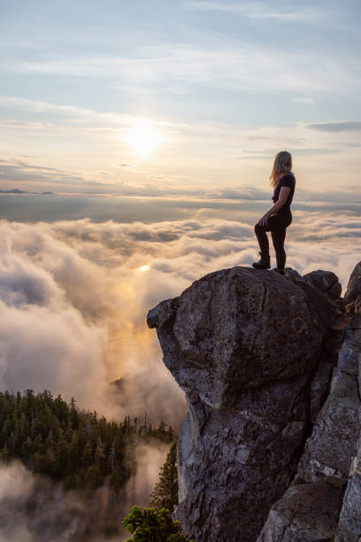 istock Girl on top of a Mountain 1161425980