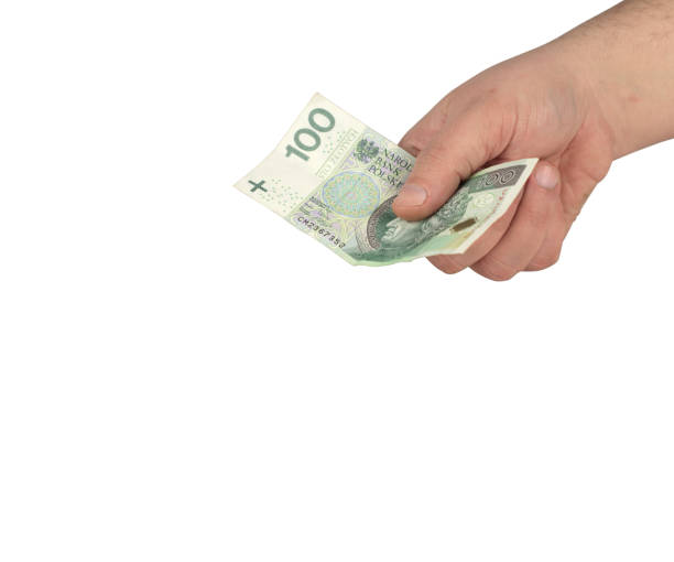 istock one hundred zlotys in hands 1161427084