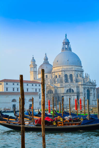 istock Basilica and gondola in Venice 1161429377