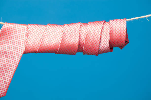 istock Knotted tie and hanging on a rope 1161429383