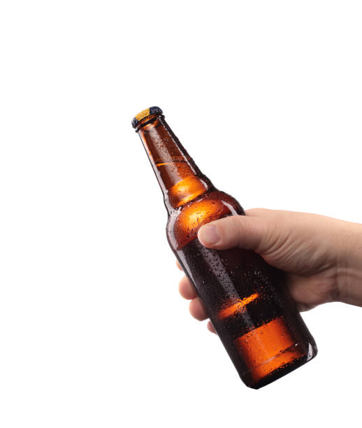 istock bottle of beer tied in a hand 1161430472